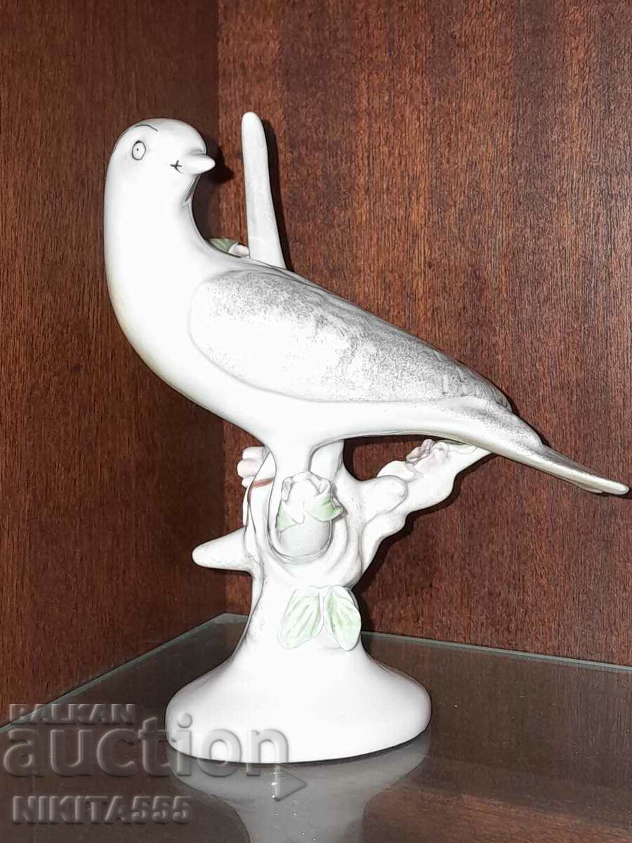 Old beautiful porcelain bird figure from Romania