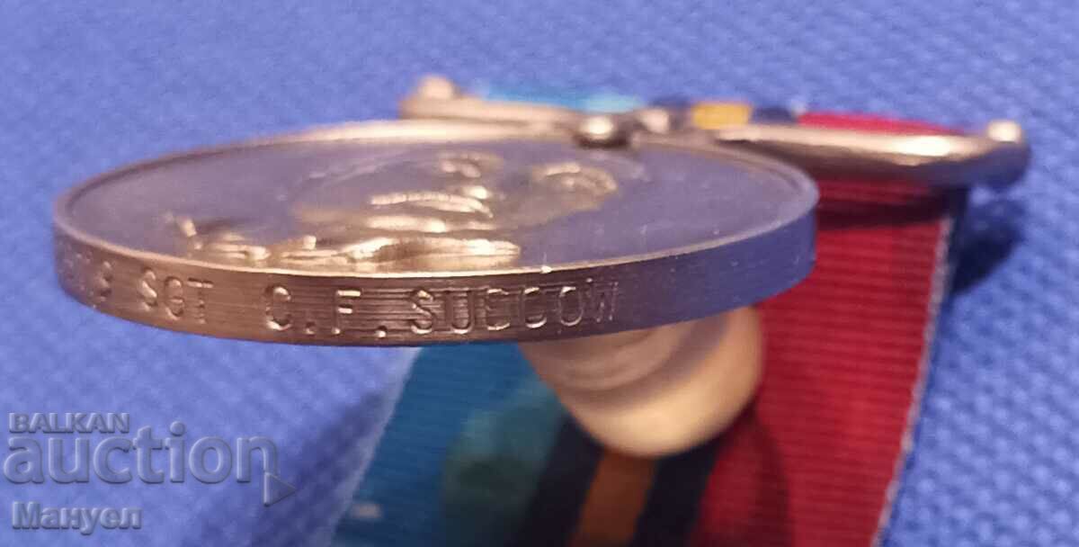 Delivery of Southern Rhodesia Police medal, numbered and inscribed. Delivery of Southern Rhodesia Police medal, numbered and inscribed.