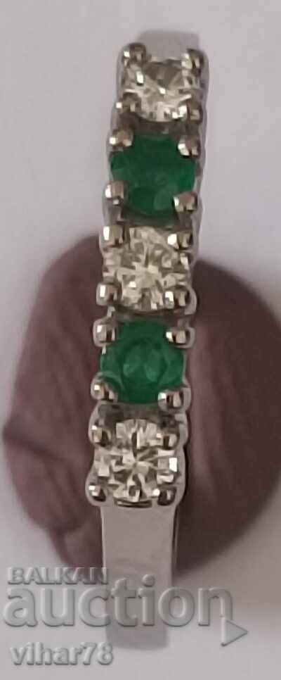 Auction 18k white gold ring with diamonds and emeralds Auction 18k white gold ring with diamonds and emeralds