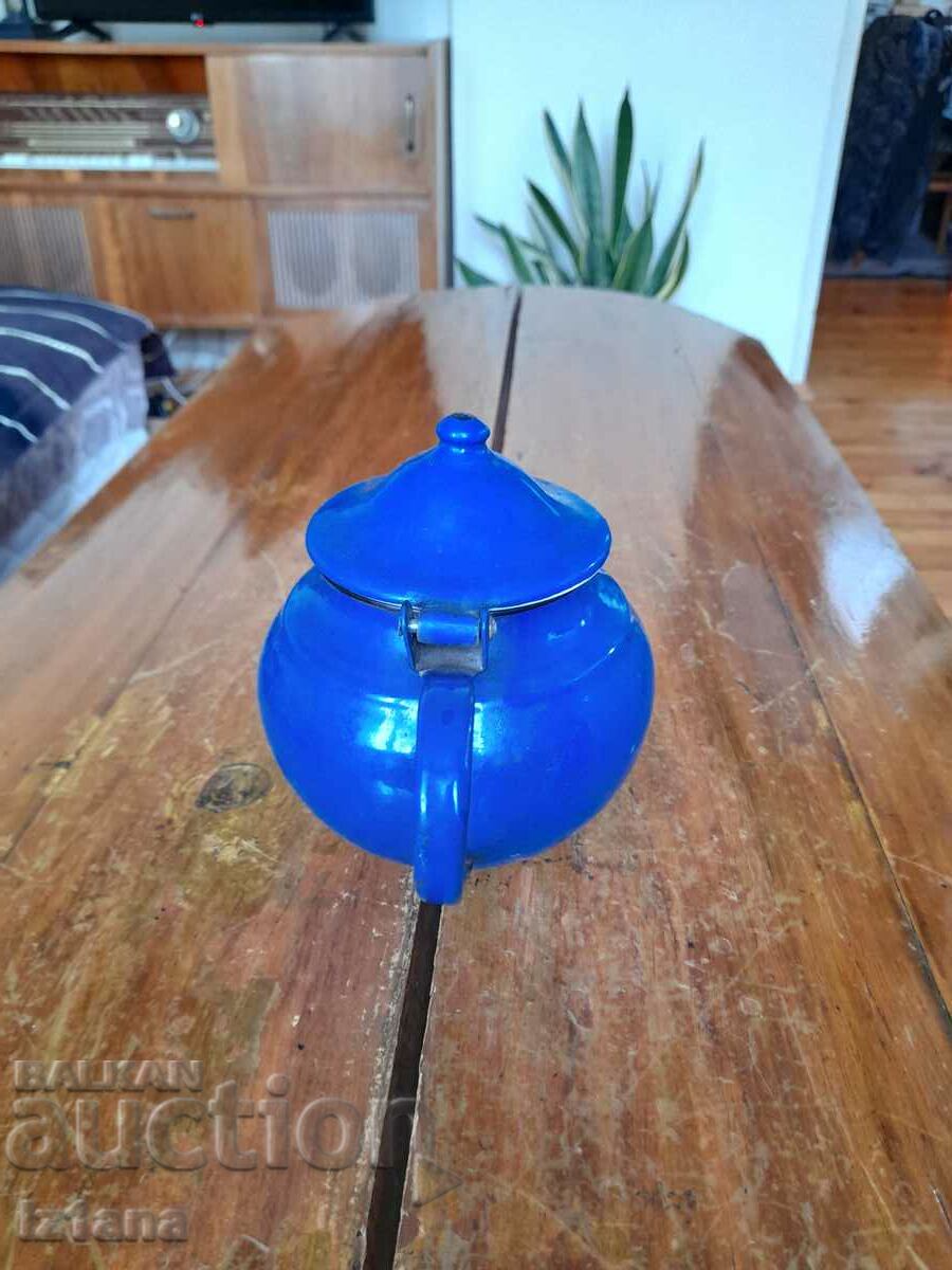 Delivery of Old enamel teapot