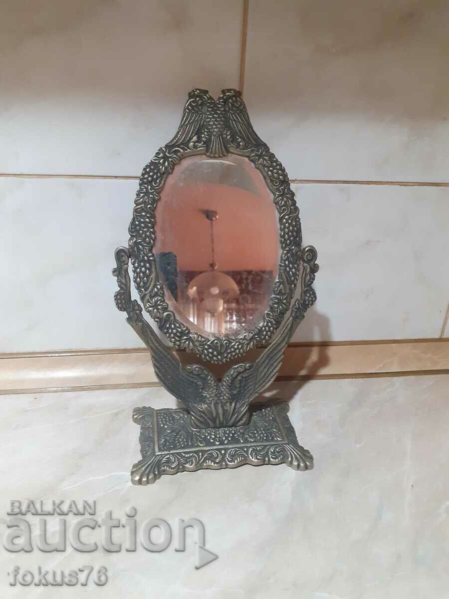 Delivery of Old bronze table mirror with double-headed eagle Delivery of Old bronze table mirror with double-headed eagle