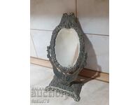Old bronze table mirror with double-headed eagle