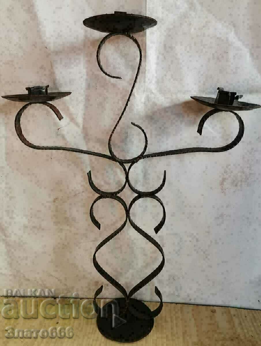 Old forged candle holder