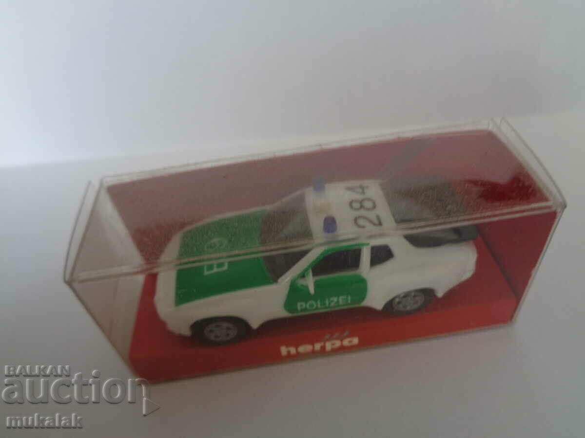 Auction HERPA 1:87 H0 PORSCHE 944 POLICE TOY TROLLEY MODEL Auction HERPA 1:87 H0 PORSCHE 944 POLICE TOY TROLLEY MODEL
