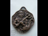 Metal medallion - god Neptune.