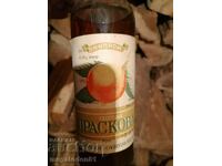 An old bottle of "Golden peach" liqueur from the social years