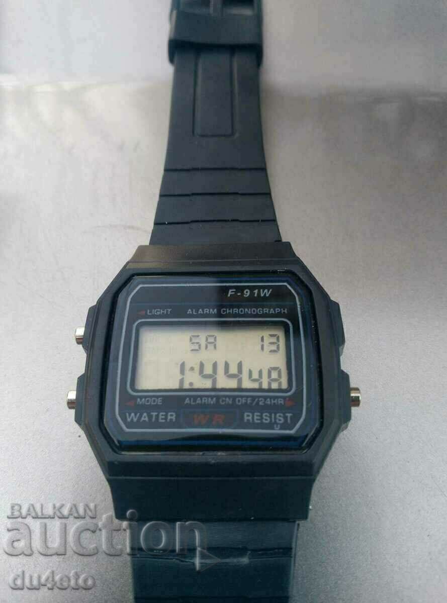 Delivery of Men's wristwatch F-91W, time, date, chronometer, alarm, ca Delivery of Men's wristwatch F-91W, time, date, chronometer, alarm, ca