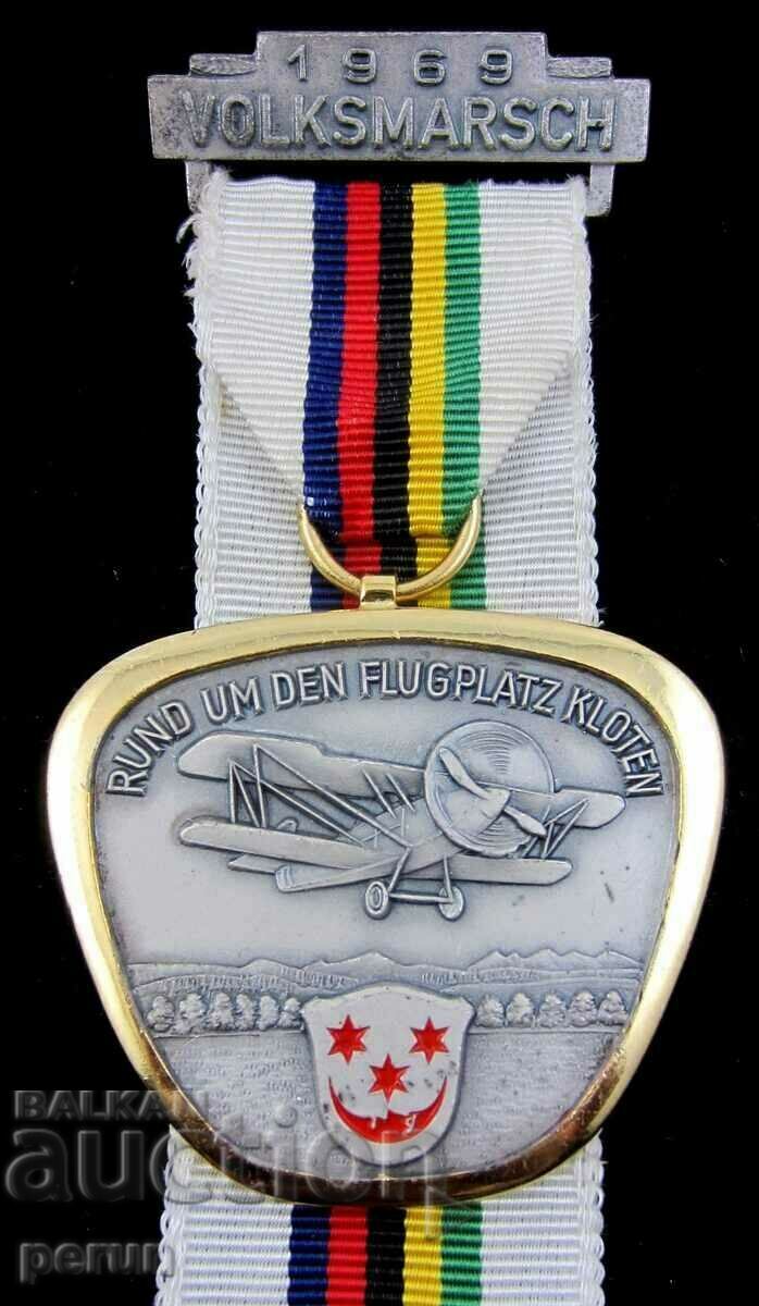 НАРОДЕН МАРШ-1969г-ЛЕТИЩЕ КЛОТЕН-ЩВЕЙЦАРИЯ-МЕДАЛ-ОРИГИНАЛ с цена 16.00 лв. | € 8.18 НАРОДЕН МАРШ-1969г-ЛЕТИЩЕ КЛОТЕН-ЩВЕЙЦАРИЯ-МЕДАЛ-ОРИГИНАЛ с цена 16.00 лв. | € 8.18