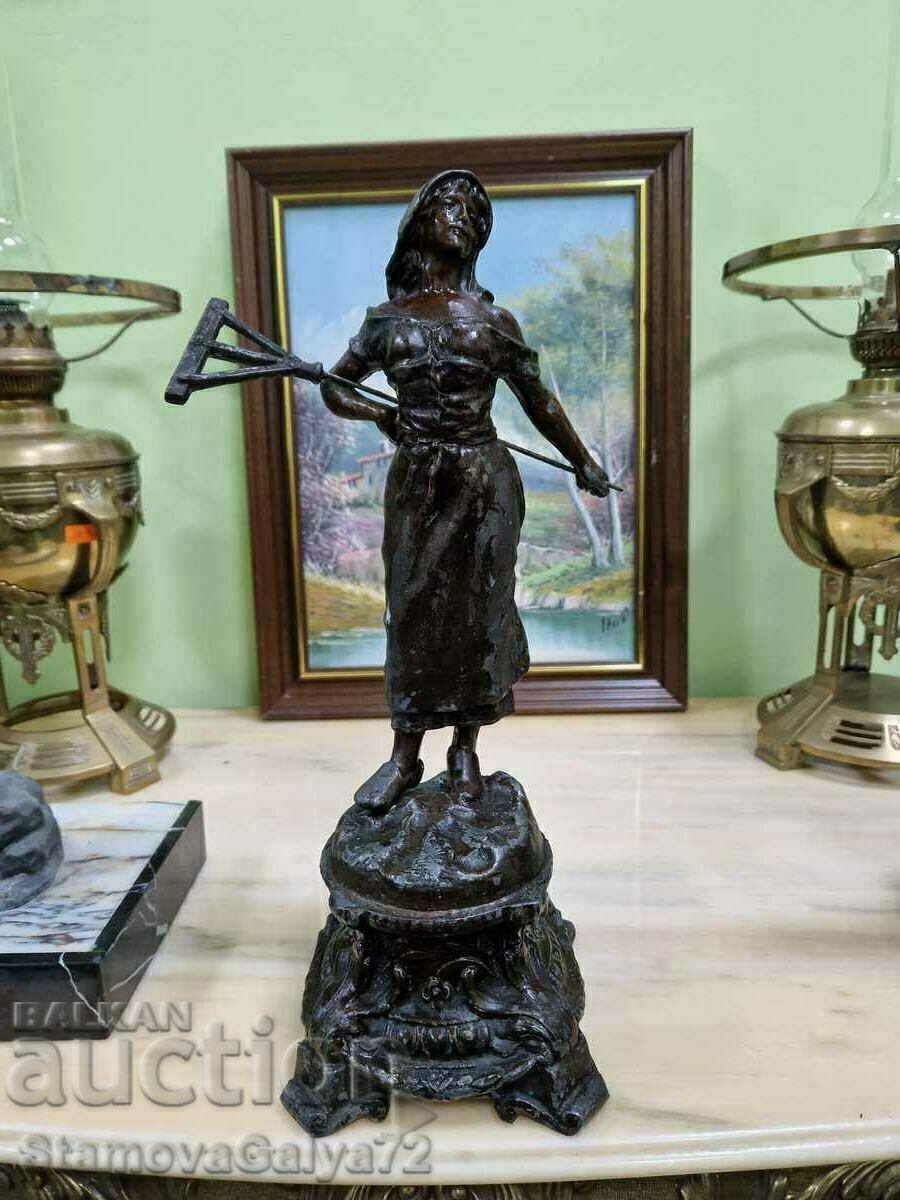 A beautiful antique French figure statuette A beautiful antique French figure statuette