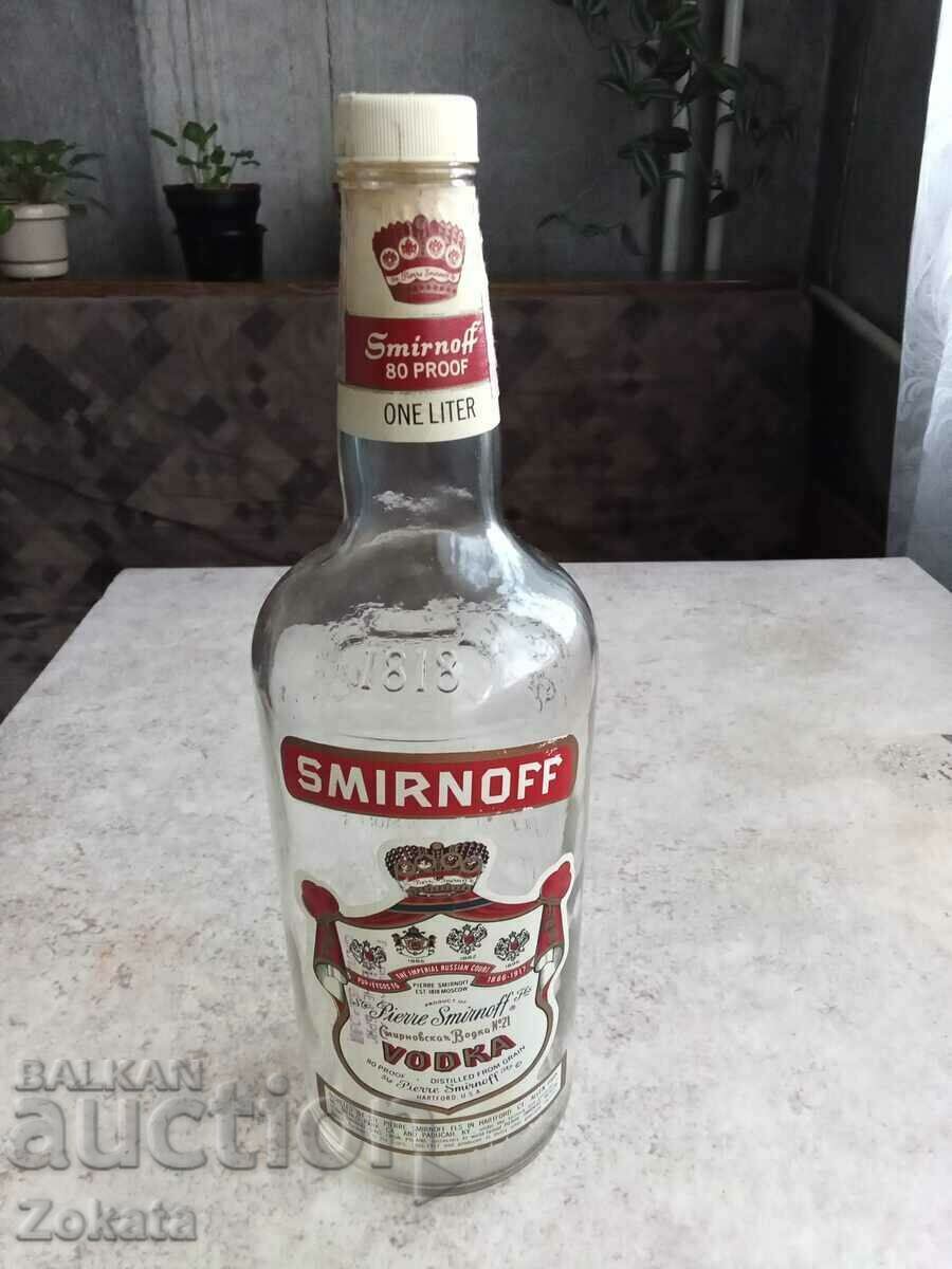A bottle of SMIRNOFF U.S.A. Vodka.