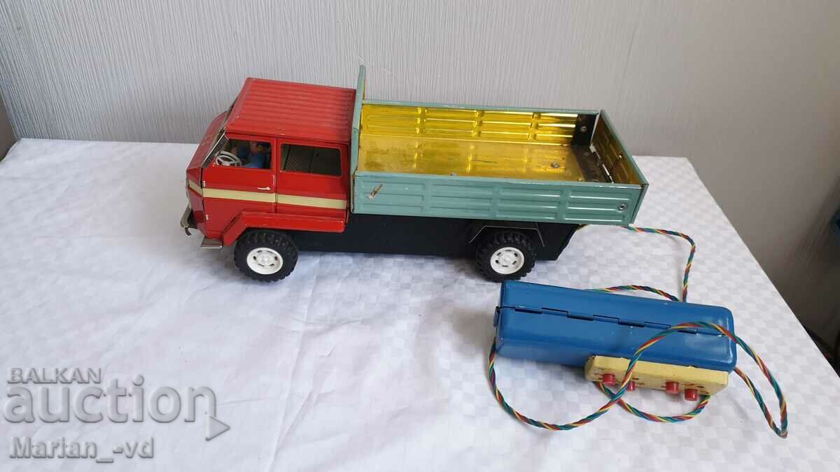 Old Chinese tin toy dump truck with remote control with price 190.00 BGN | € 97.15 Old Chinese tin toy dump truck with remote control with price 190.00 BGN | € 97.15