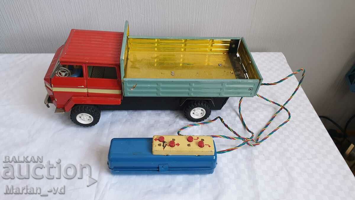 Old Chinese tin toy dump truck with remote control