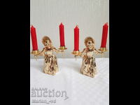 Two new Italian metal candlesticks with a girl