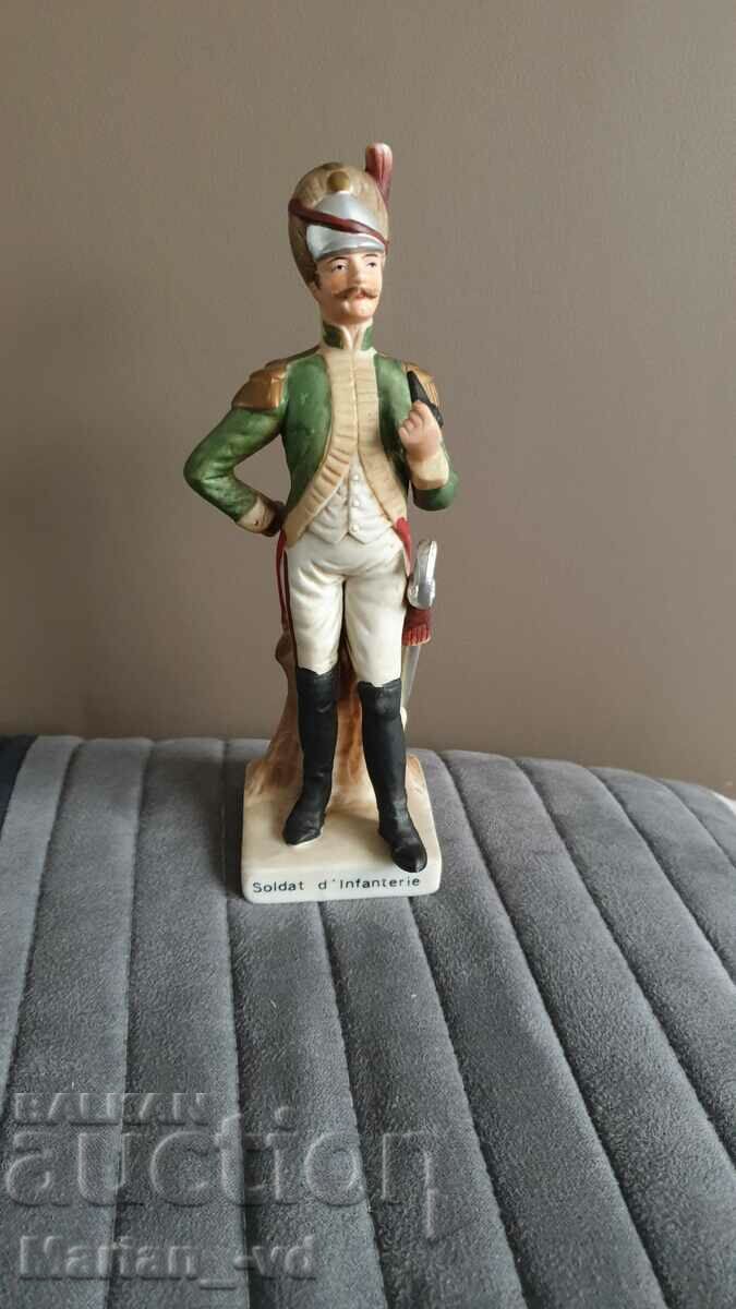 Auction A 20th century FRANCE porcelain figure of an infantryman Auction A 20th century FRANCE porcelain figure of an infantryman