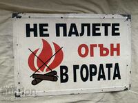 Metal sign, do not light a fire in the forest,