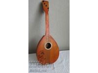 Old soca children's mandolin