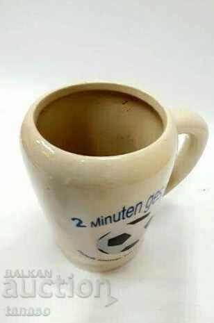 Auction  German porcelain cup, mug, football