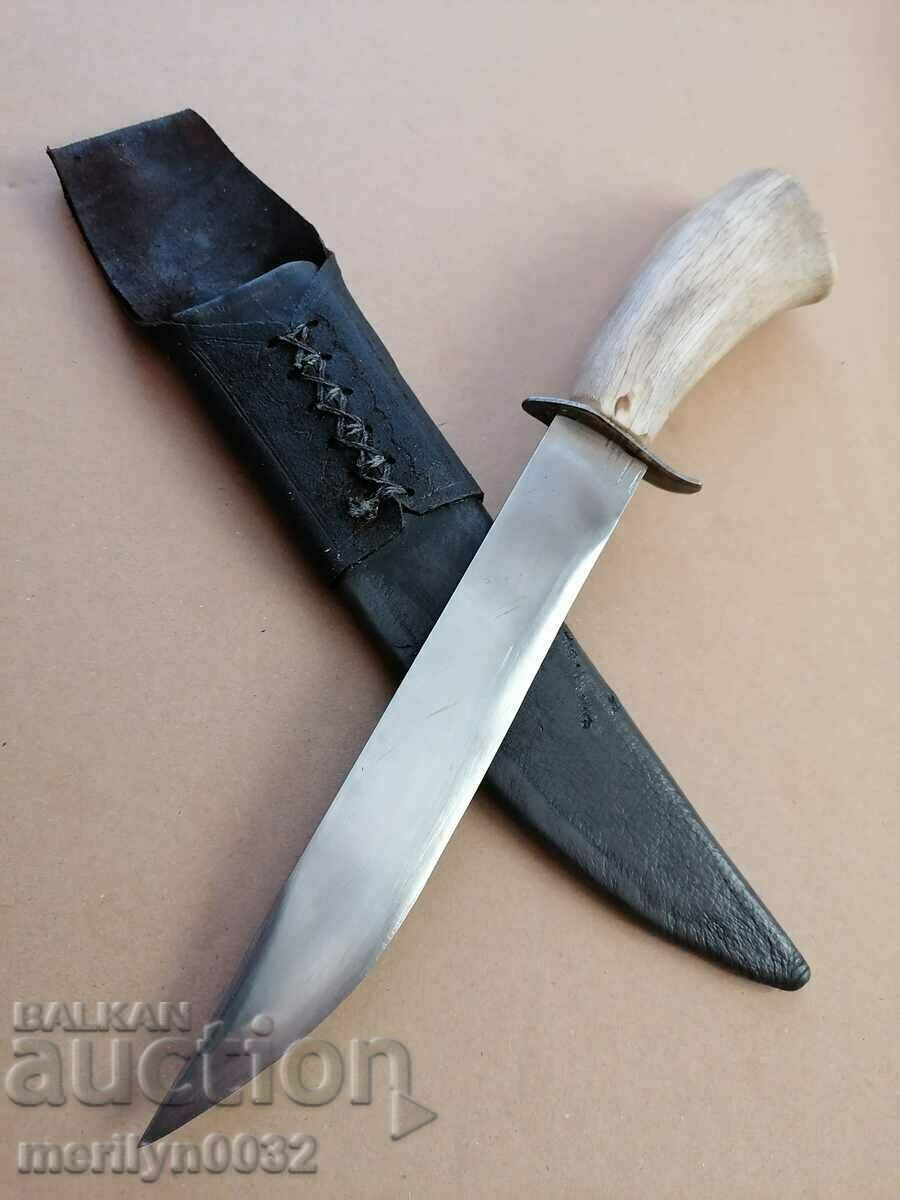 Hunting knife with a deer antler handle