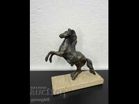 Statuette of a bronze horse on a granite plinth. #4906