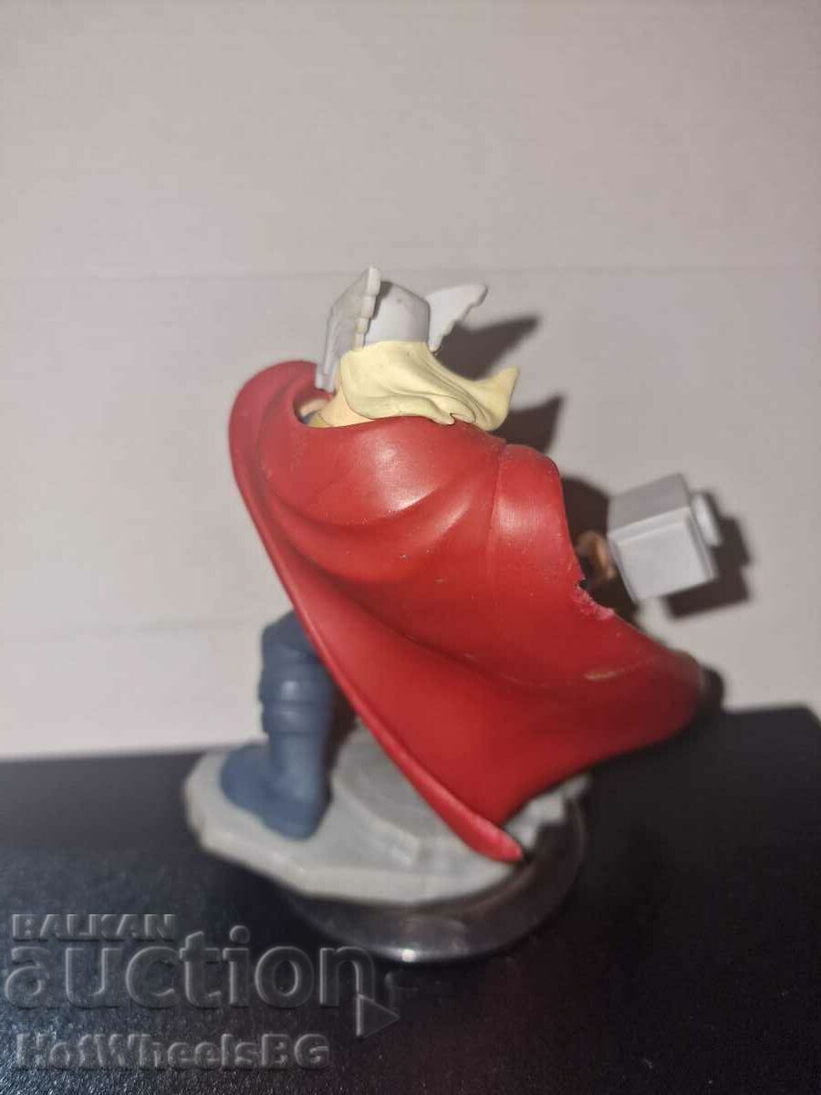 Auction Superhero figurine Auction Superhero figurine