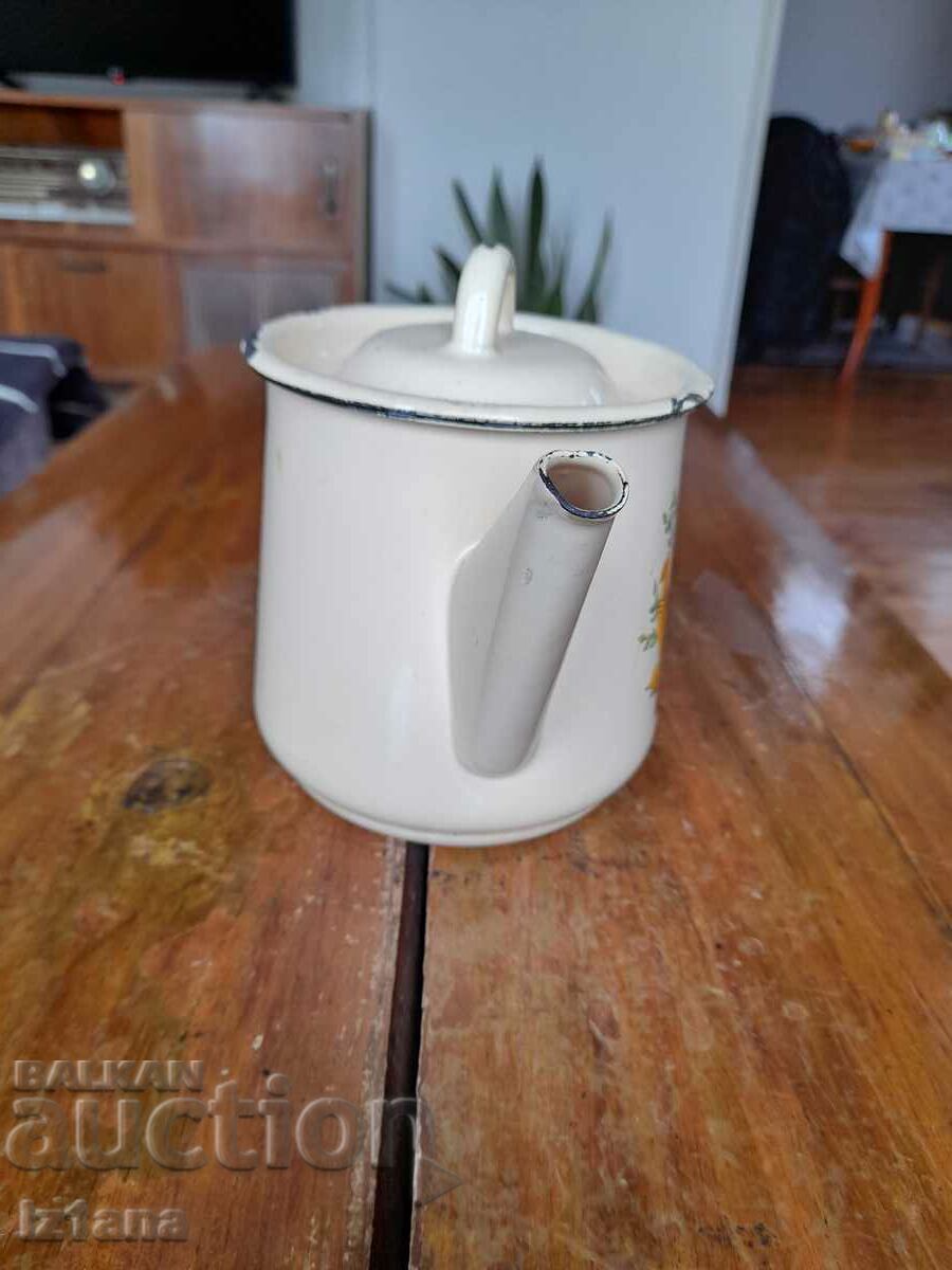 Old enamel teapot with price 35.00 BGN | € 17.90 Old enamel teapot with price 35.00 BGN | € 17.90
