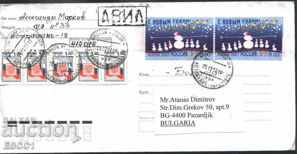 Traveled envelope with stamps New Year 2007 from Russia