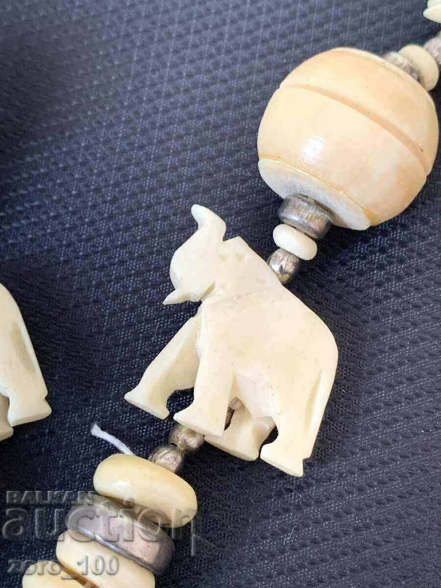 Auction Necklace, good imitation ivory Auction Necklace, good imitation ivory