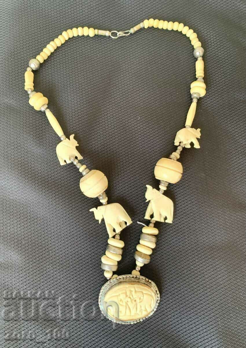 Necklace, good imitation ivory