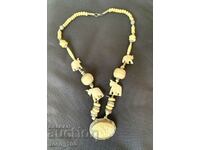 Necklace, good imitation ivory