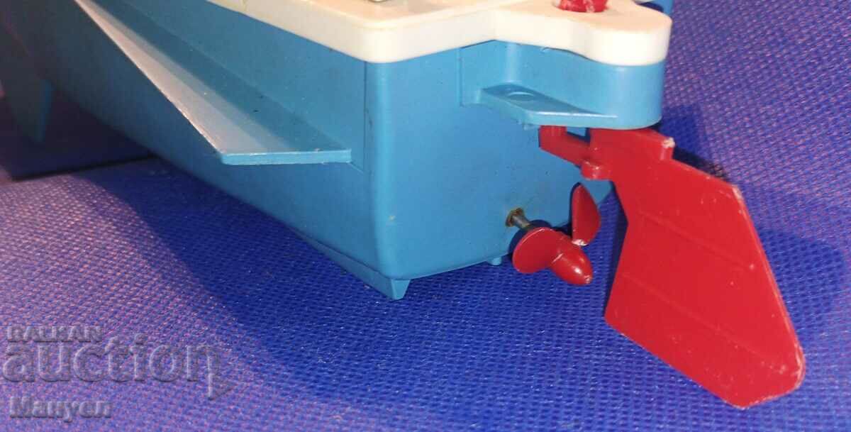 Delivery of An old toy - a motor boat Delivery of An old toy - a motor boat