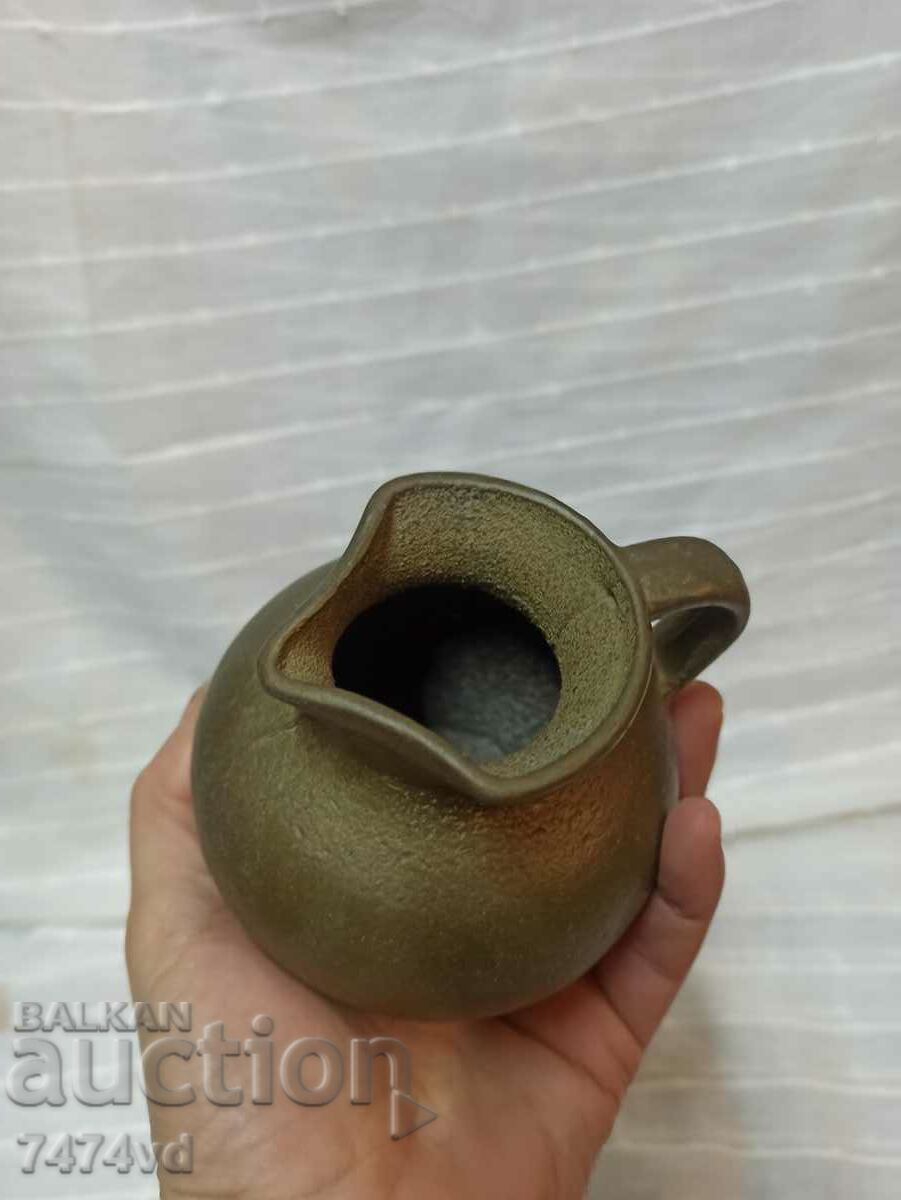 Delivery of A MASSIVE QUITE SMALL BRONZE JUG