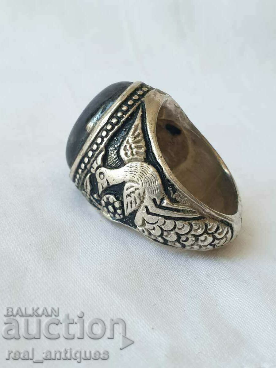 Silver ring with black sapphire