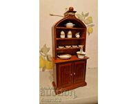 Old wooden cabinet with service – Toy.