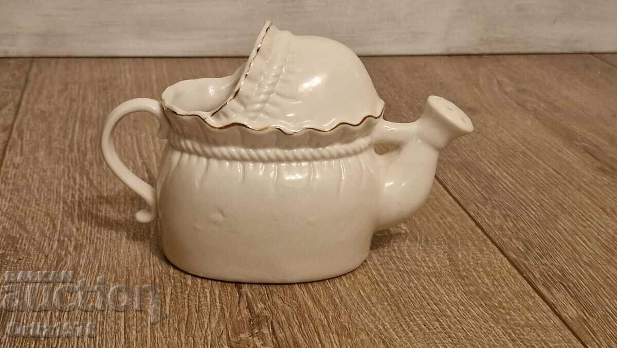 Delivery of Old porcelain watering can, jug. Delivery of Old porcelain watering can, jug.