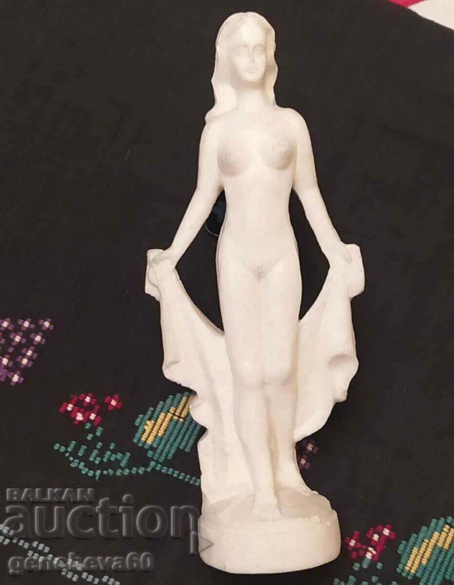 Vintage erotic sculpture of a woman