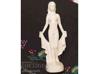 Vintage erotic sculpture of a woman