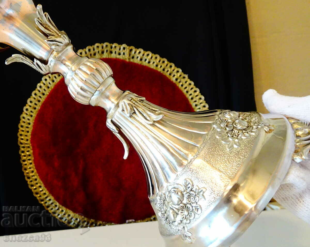 Delivery of Silver-plated candlestick, baroque. Delivery of Silver-plated candlestick, baroque.