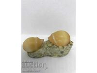 Beautiful figure Hedgehogs in love from yellow selenite