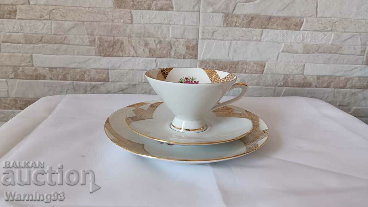 Auction Triple porcelain set - cup + two saucers Auction Triple porcelain set - cup + two saucers