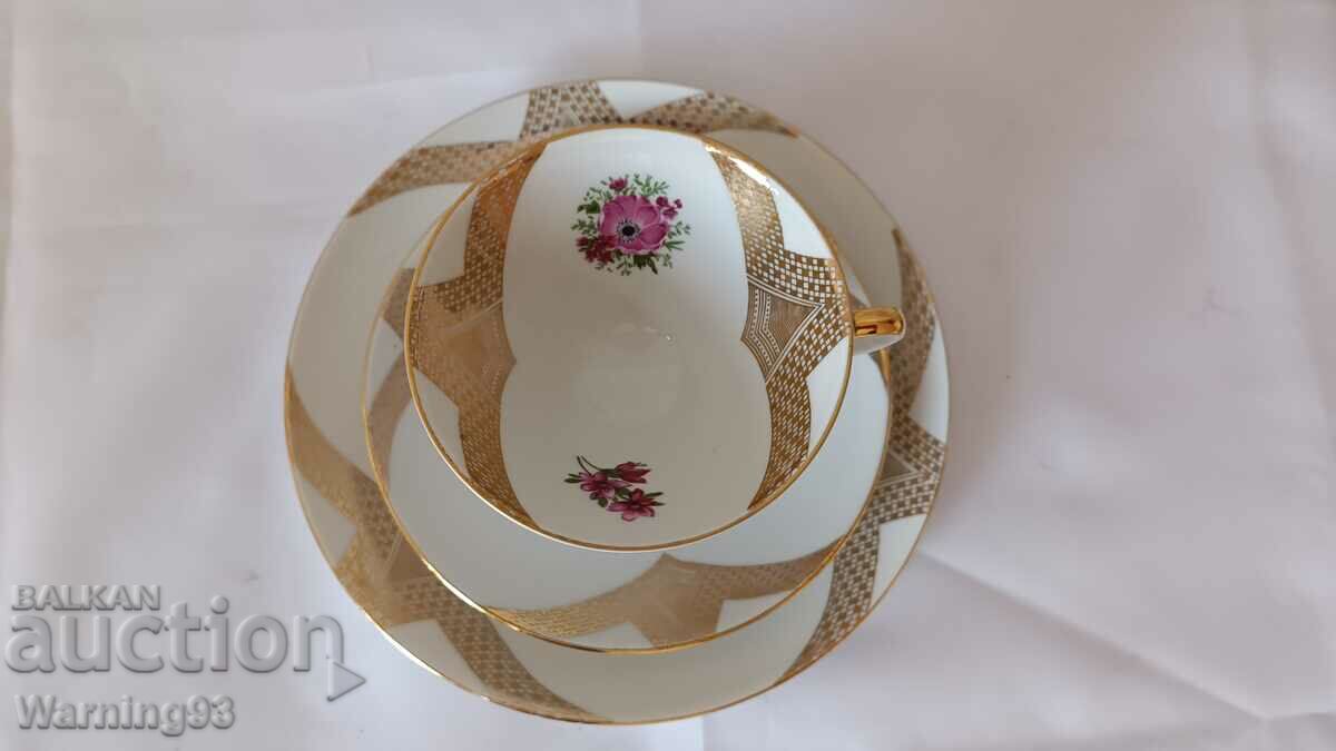 Delivery of Triple porcelain set - cup + two saucers Delivery of Triple porcelain set - cup + two saucers