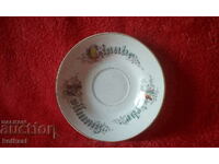 Old porcelain plate with inscriptions Faith Hope Love
