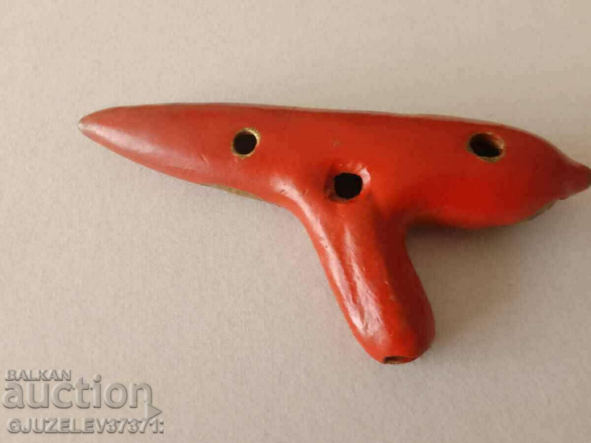 Auction  An old lucarina ceramic whistle is slightly cracked but still plays