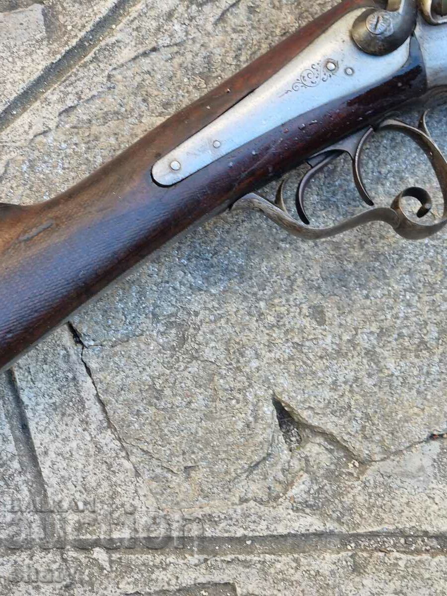 Licitație O pușcă veche. Licitație O pușcă veche.