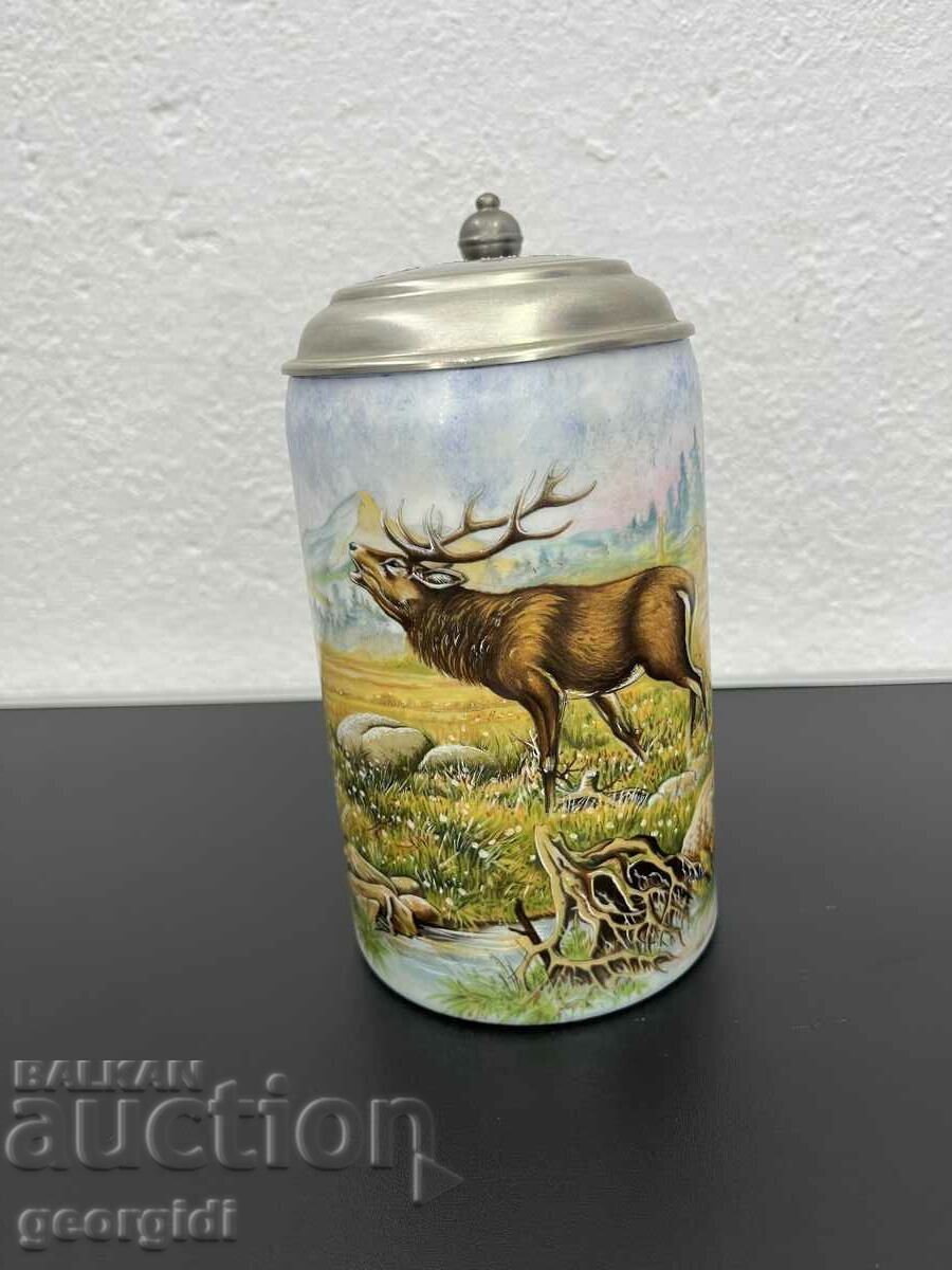A unique German mug with a painted forest scene. #4988