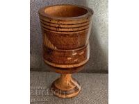 Old wooden goblet, glass