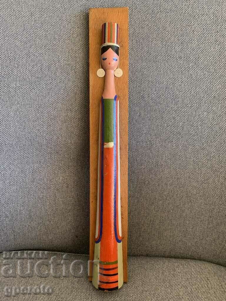 Wooden old ethnic panel with a woman Wooden old ethnic panel with a woman