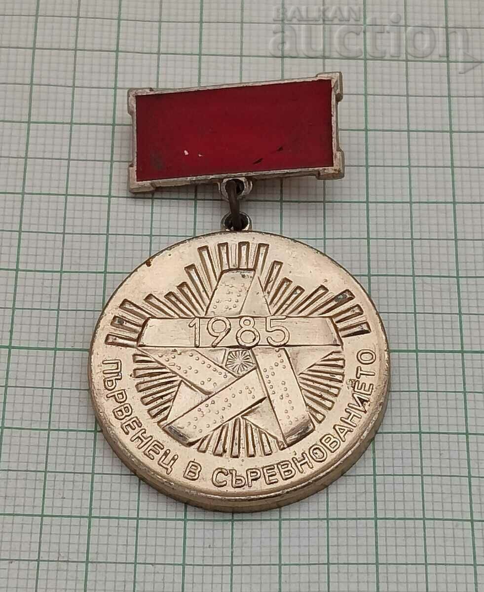 1985 COMPETITION FIRST BADGE