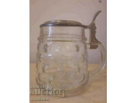 Glass beer mug with lid