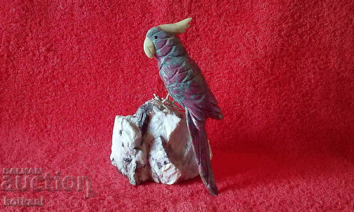 A beautiful figure of semi-precious stones and minerals Parrot