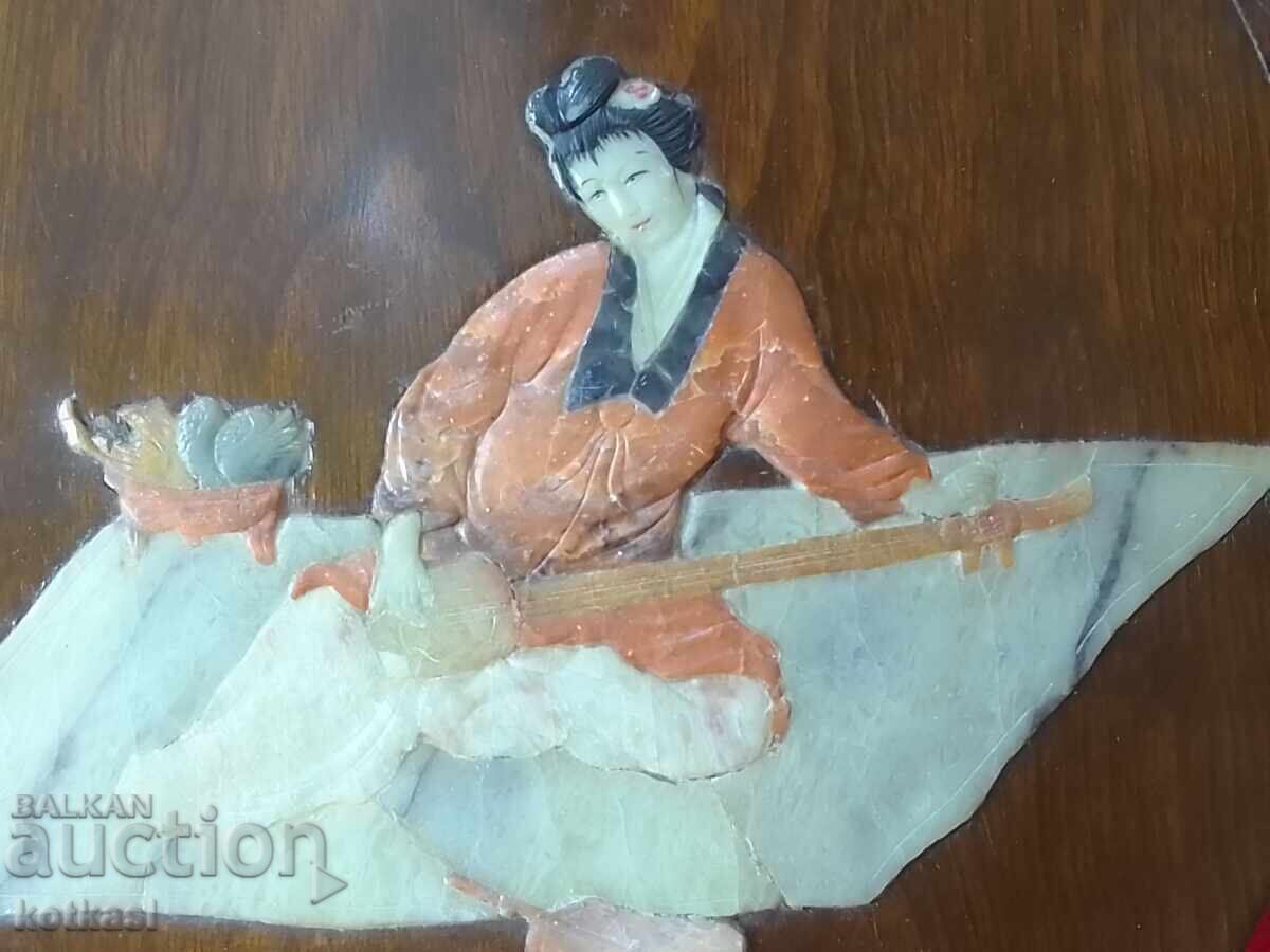 Auction  Wooden panel with musician semi-precious stone jade